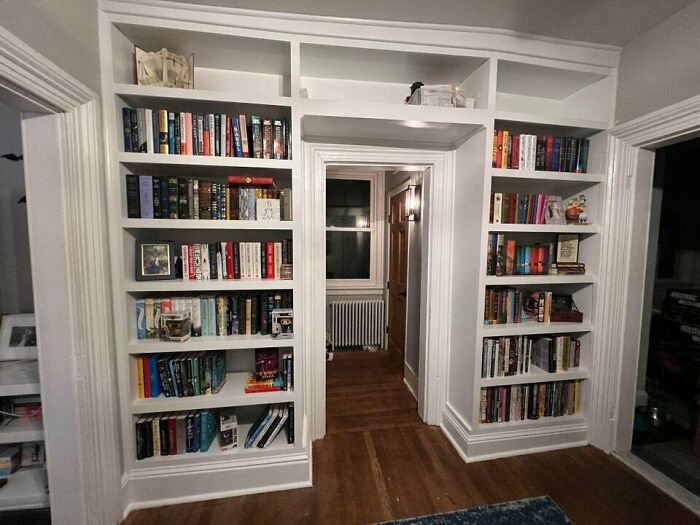 White bookshelves with books 
