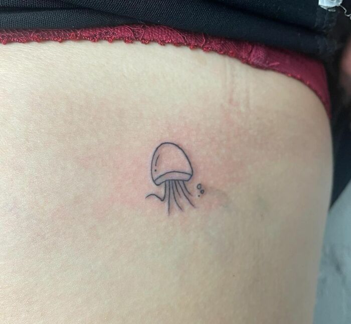 minimalistic tattoo of a jellyfish