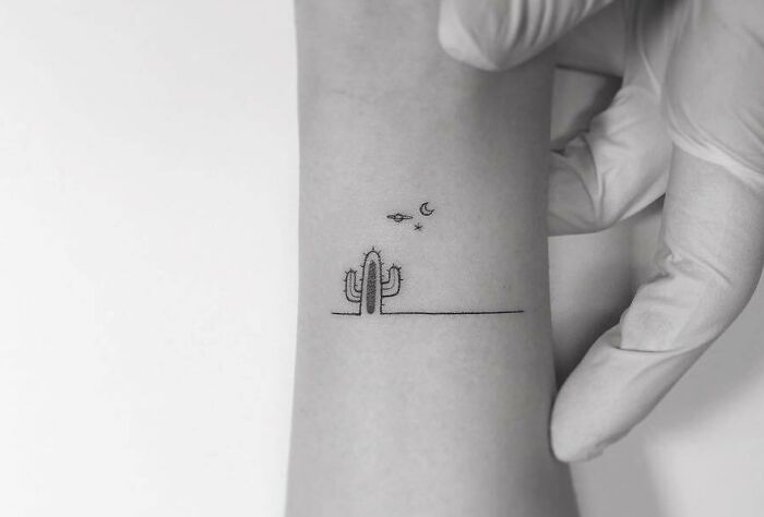Minimalistic cactus tattoo