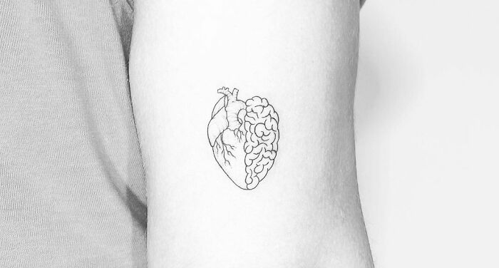 Minimalistic heart-brain tattoo