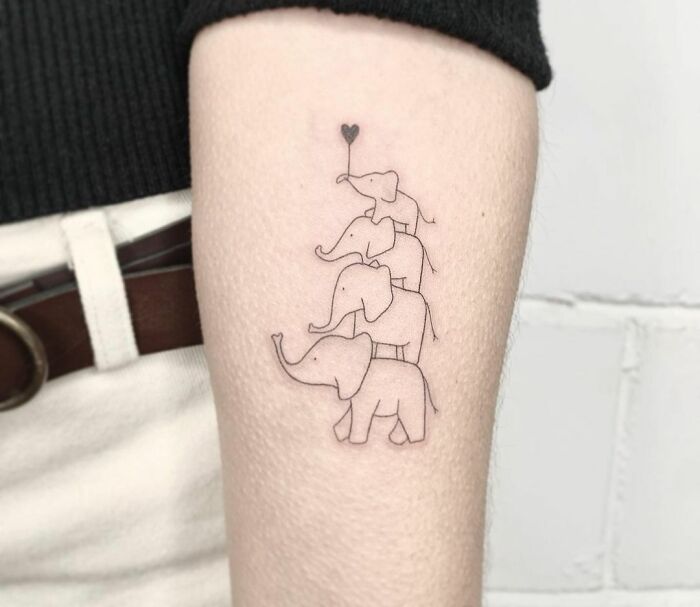 Minimalistic elephant family tattoo