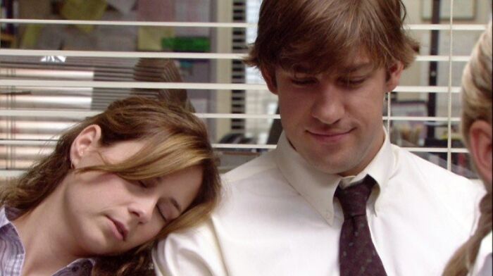 Pam sleeping on the Jim's shoulder 