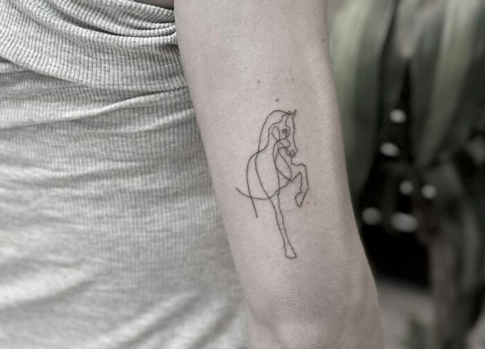 Single line horse raising leg tattoo