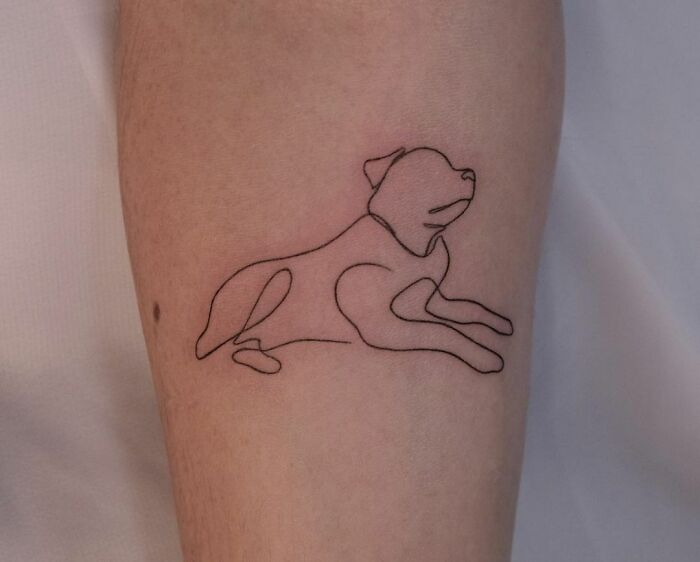 Single line sitting dog tattoo