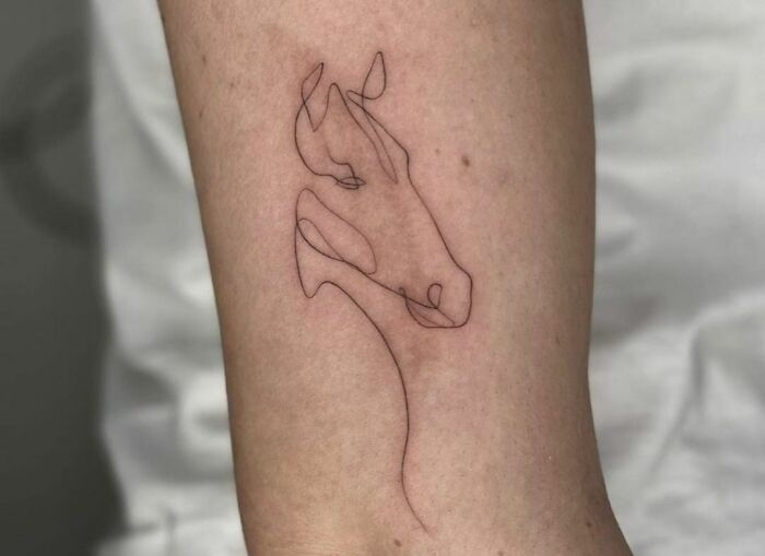 Single line horse head tattoo