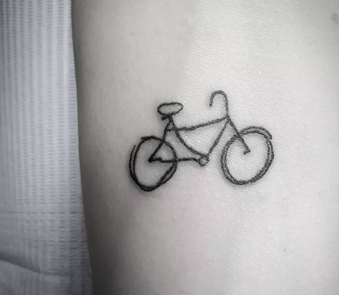 Single line bicycle tattoo