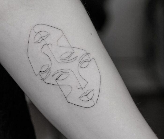 Single line masks tattoo