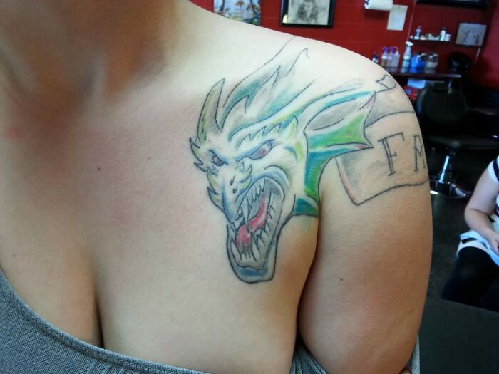 Funny Dragon Shoulder Piece Tattoo