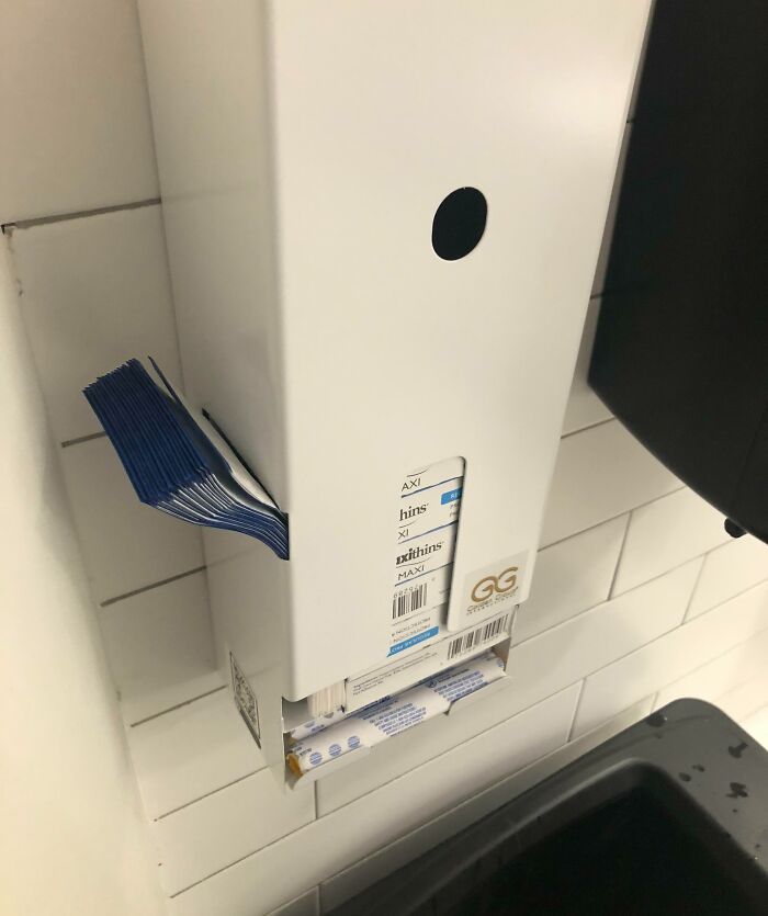 My Local Library's Men's Bathroom Has A Tampon Dispenser