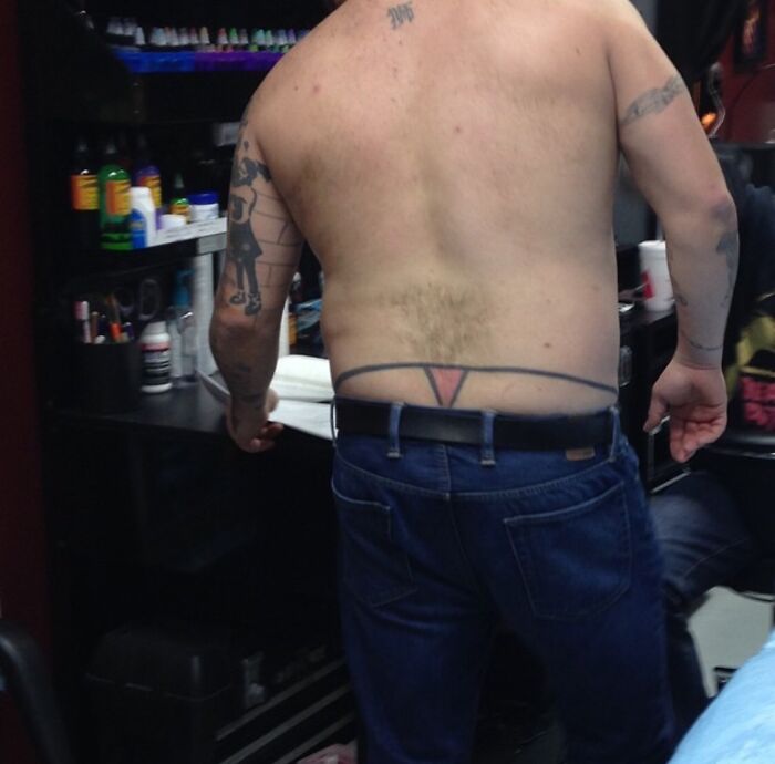 Red thong back tattoo 