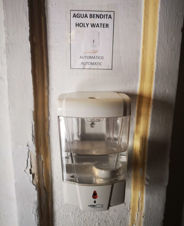 Automated Holy Water Dispenser Seen In A Church In Spain