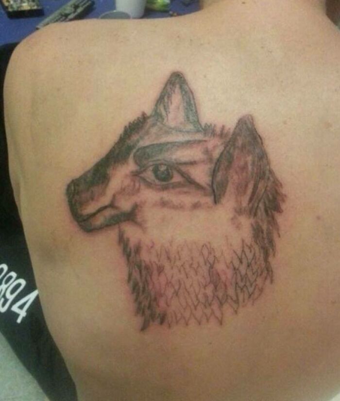 Funny Llama Or Wolf Back Tattoo