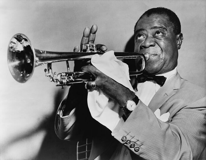 Louis Armstrong playing trumpeter