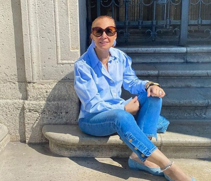 Danielle Steel wearing blue shirt and jeans 