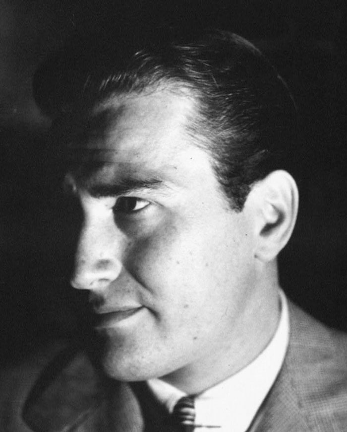 Artie Shaw wearing a suit and tie 