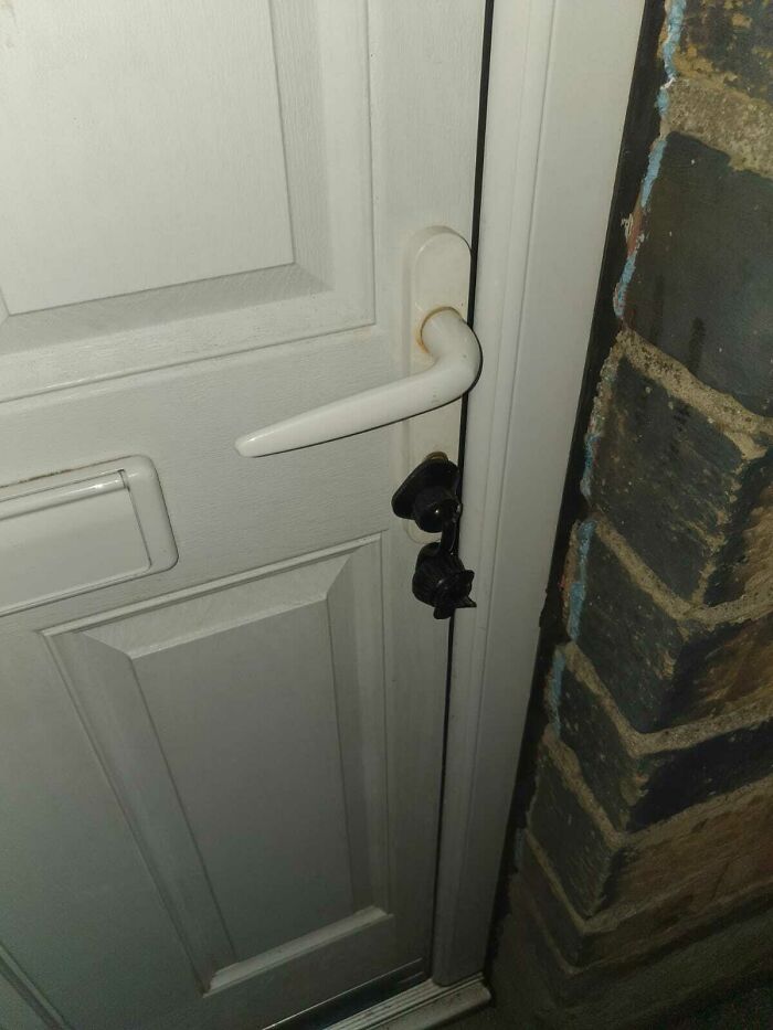 Came Home To Find This Device Attached To My Front Door Covering The Key Lock. What Is It And What Should I Do? Is It Safe To Open? Who Would Have Installed It?