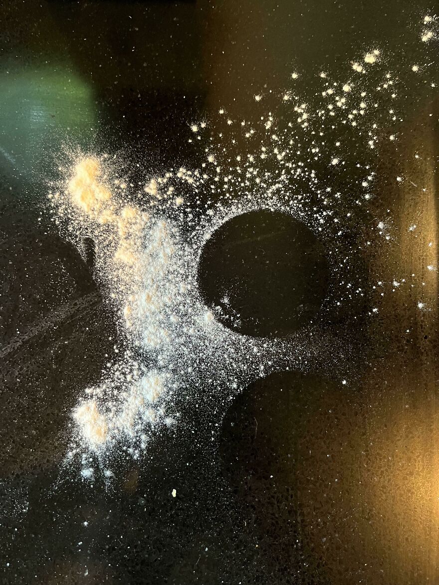 Spilled Flour On Black Countertop = Cosmic Event