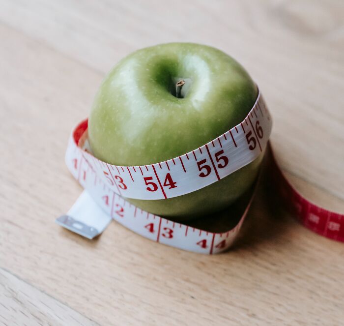Apple surrounded by a meter 