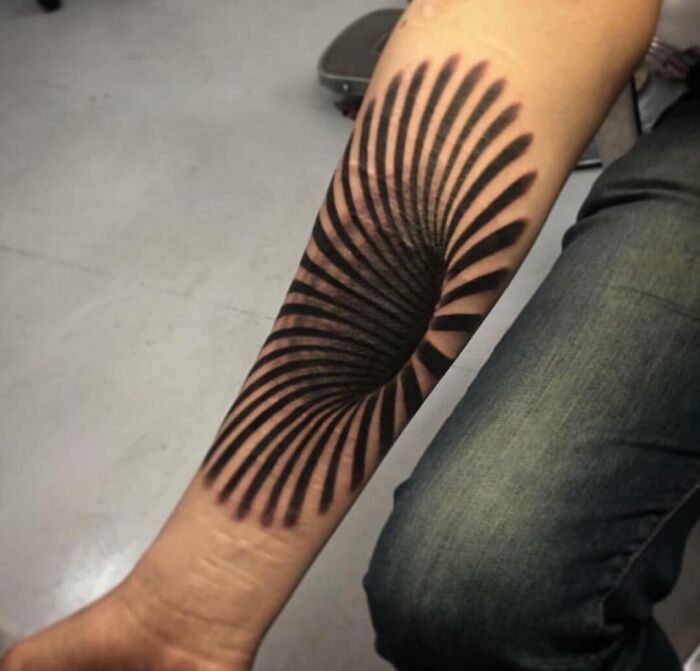 Infinity Hole Optical Illusion Arm Tattoo 