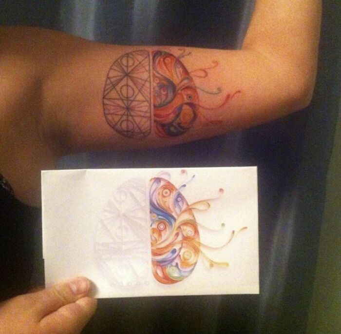 Aged tattoo showing faded colors compared to a fresh design on paper.