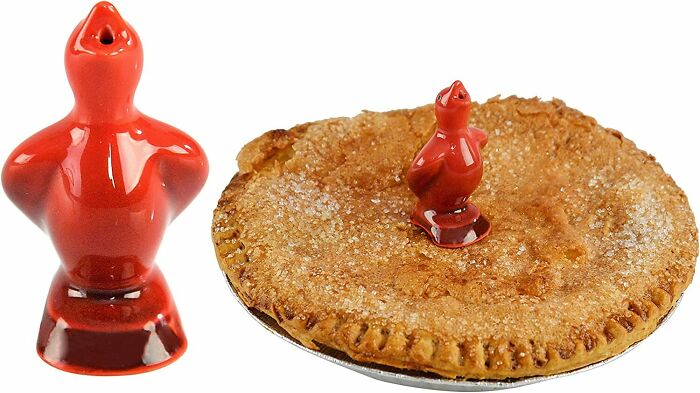 Ceramic red pie bird on a pie 