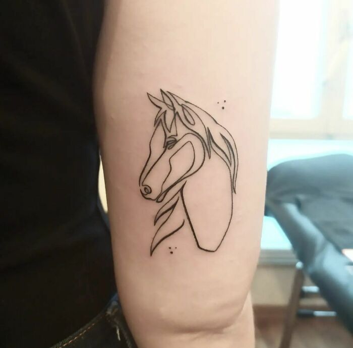 Single line horse arm tattoo