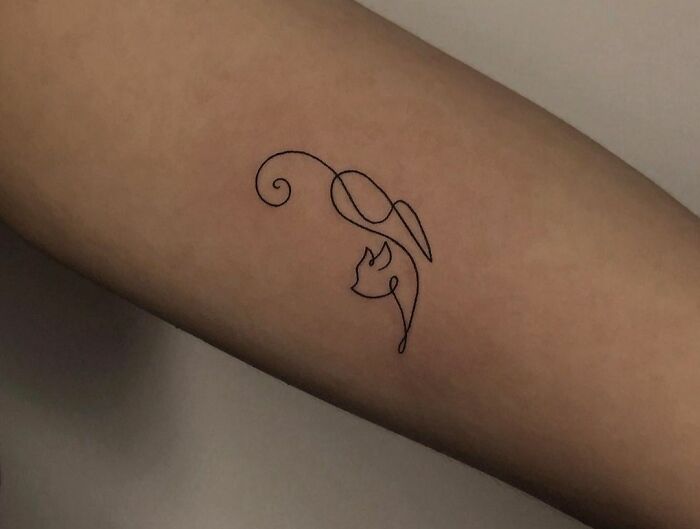 Line cat arm tattoo