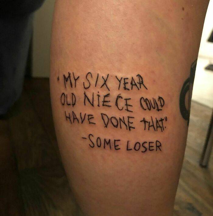 Text leg tattoo 