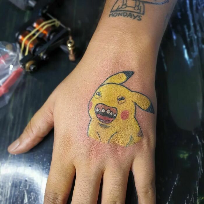 Funny Odd Pikachu Hand Tattoo