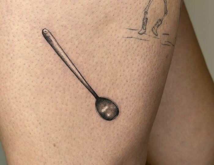 Ice cream spoon leg tattoo 