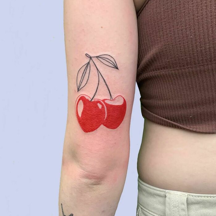minimalistic tattoo of cherries