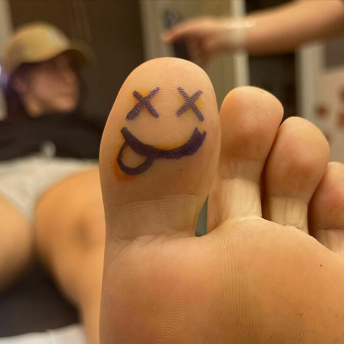 Funny Smiley Face Toe Tattoo