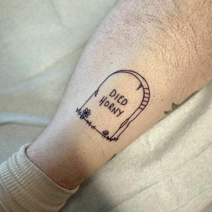 Funny gravestone leg tattoo 