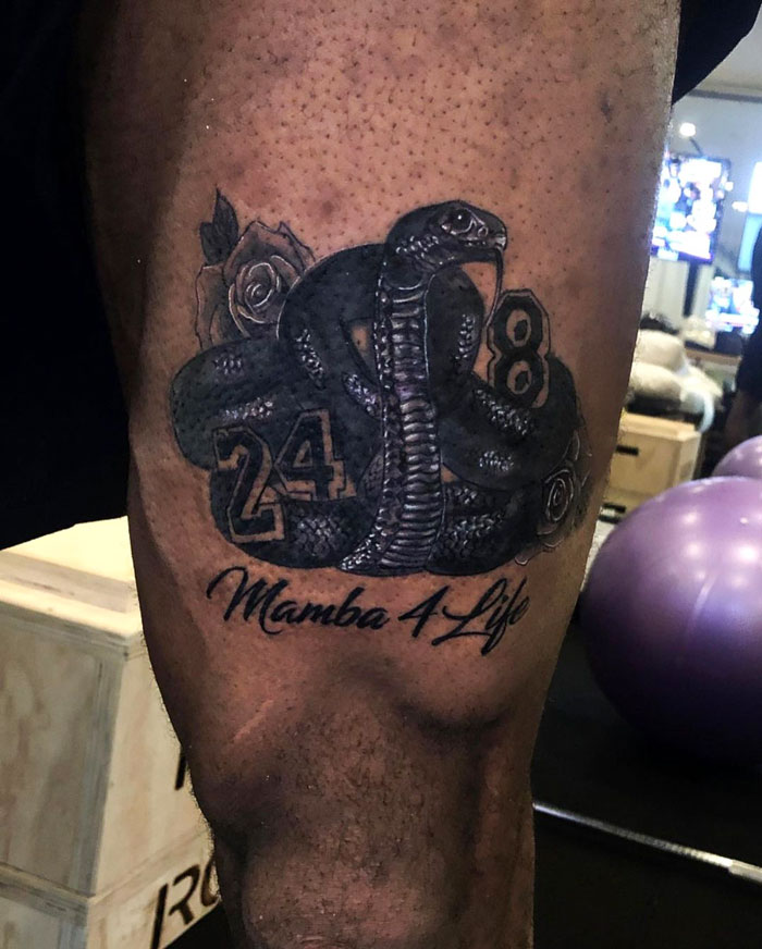 Celebrity tattoo: a snake with "24" and "8," and "Mamba 4 Life" text, inked on a person's leg.