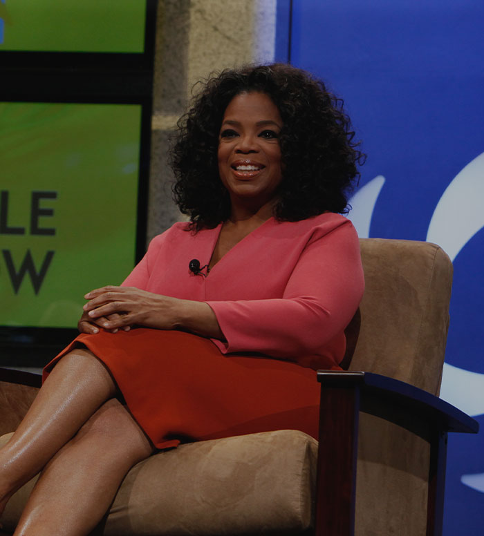 Picture of Oprah Winfrey sitting at show