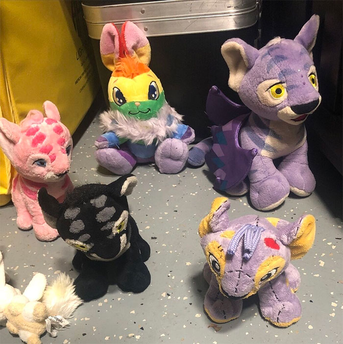 Plush animal toys in bright colors displayed on a floor, representing nostalgic big trends from the past.