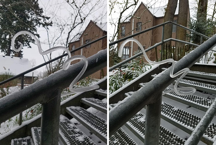 Check Out This Crazy Upside-Down Spiral Icicle I Found This Morning (There Is A Small Hole In The Metal Handrail)