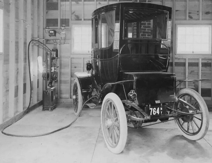 Charging An Electric Car In The Garage, New York, 1911