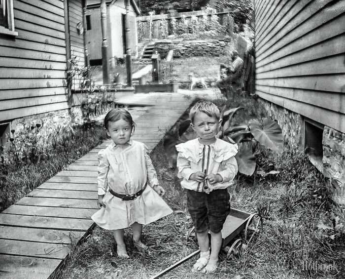 Circa 1910, These Children Were Playing With Their Little Wagon But Stopped Long Enough For This Picture To Be Taken