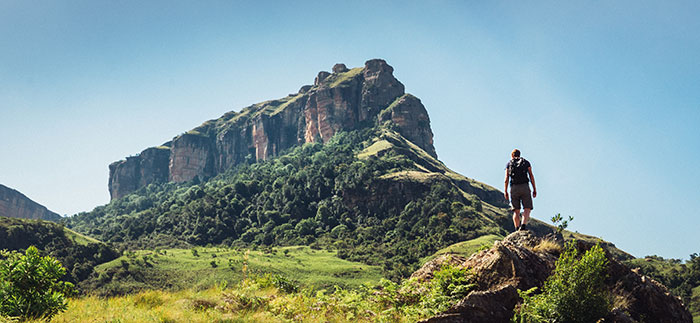 Man climbing in the Drakensberg mountains
