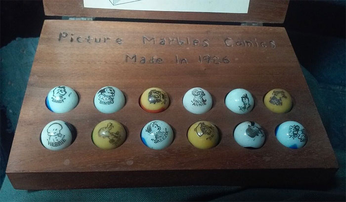 Vintage marbles in the wooden box