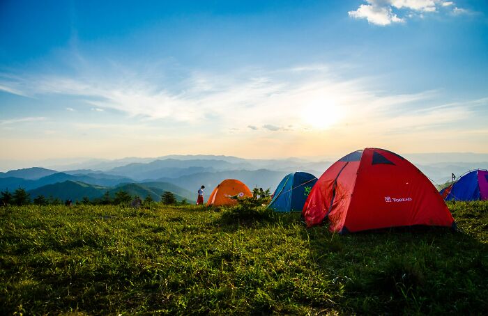 People Camping In Mountains 