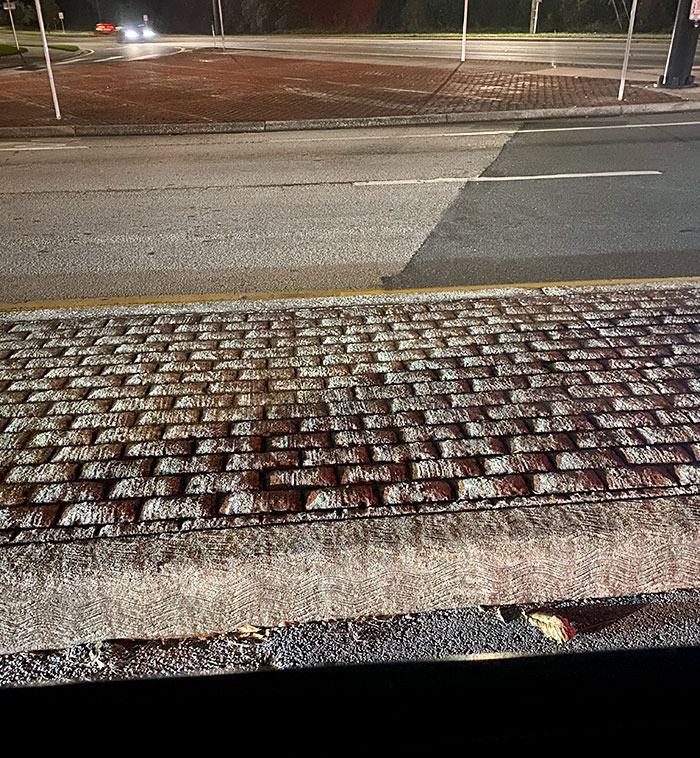 The Headlights From The Car Behind Me Made The Brick Median Look Like A 2D Video Game Texture