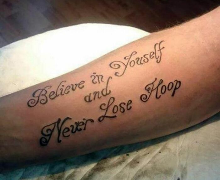 Funny wrongly spelled word arm tattoo 
