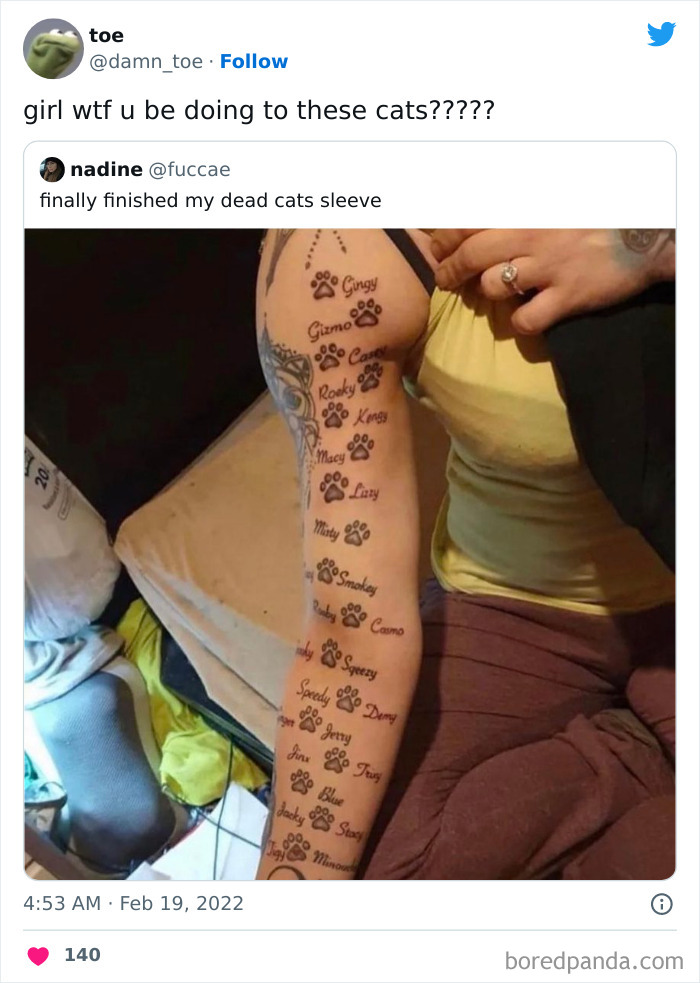 Arm with tattoo of cat names and paw prints, illustrating a tattoo fail shared on Instagram.