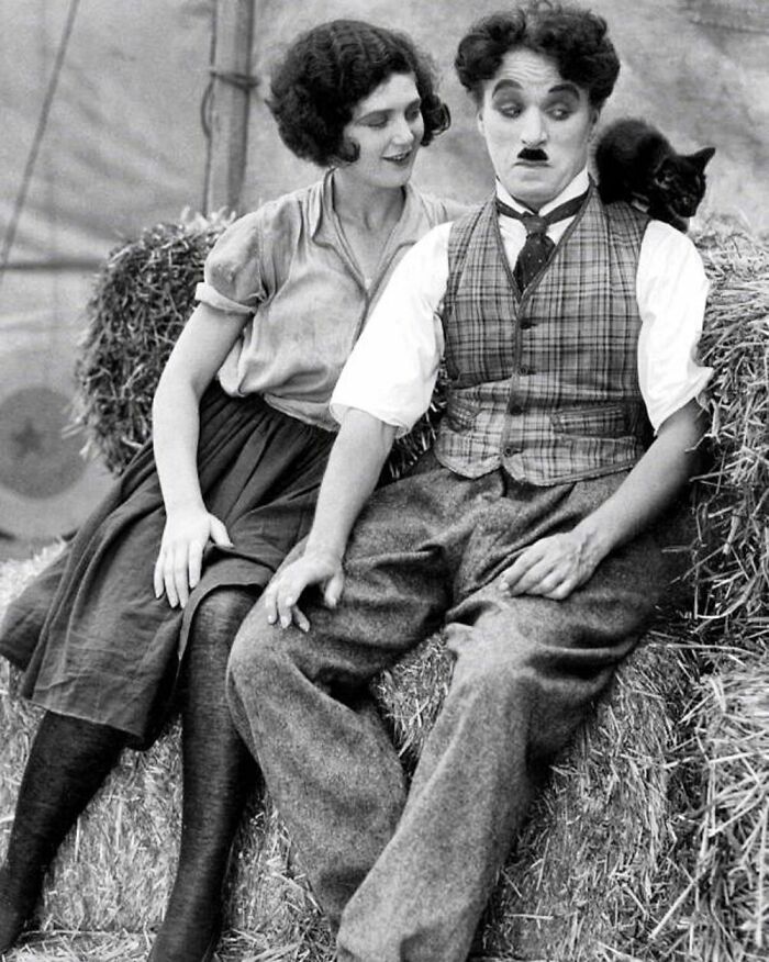 Heavyweight Trio: British Actor Charlie Chaplin, American Actress Merna Kennedy, And The Little Feline Were Photographed During The Filming Of The Movie The Circus (1928)