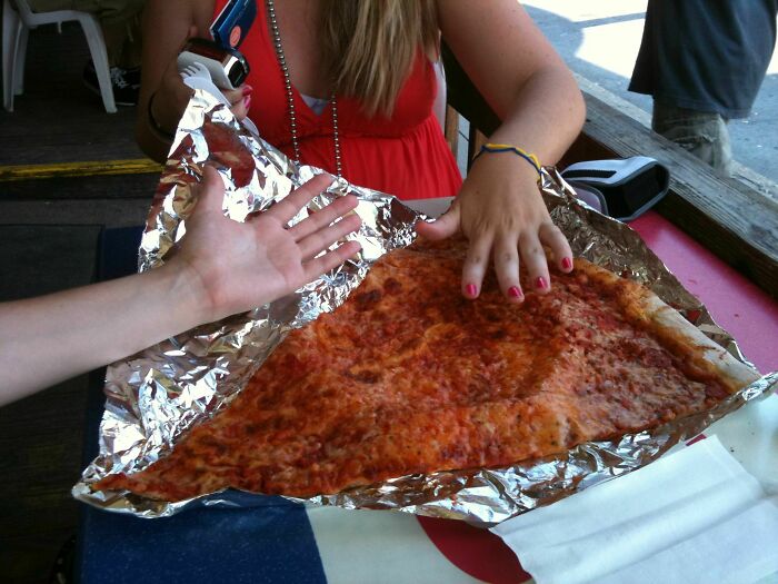 Biggest Pizza Slice Ever, And Only $5. Angelo's Pizza In Baltimore. Note That It's A Slice Of A Larger Pizza, Not Just Individually Made Large Slices. Amazing