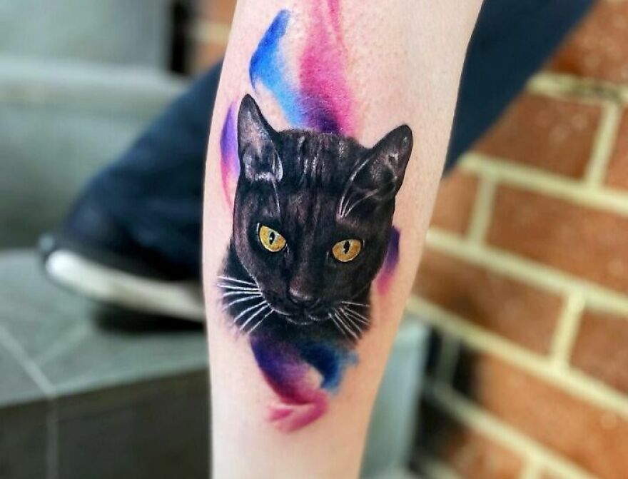 watercolor cat tattoo on the arm