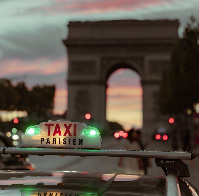 Taxi standing near the Arc De Triomphe