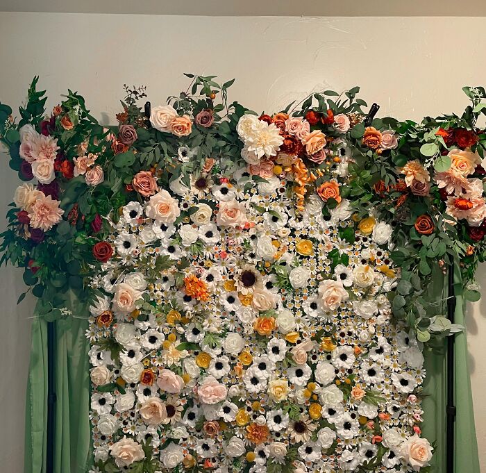 8 Bazillion Trips To Michaels And 9 Trillion Zip Ties Later, My DIY Flower Backdrop Is Done